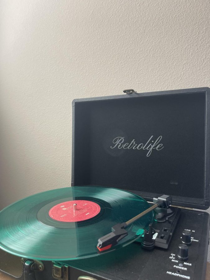 A record player spinning a vinyl.