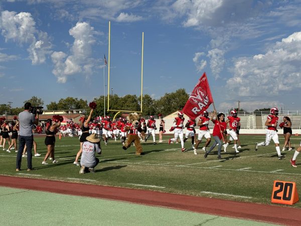 The Ram’s football team makes their way onto the field of Ratcliffe Stadium for their first home game of the season on Saturday Sep. 9, 2023.