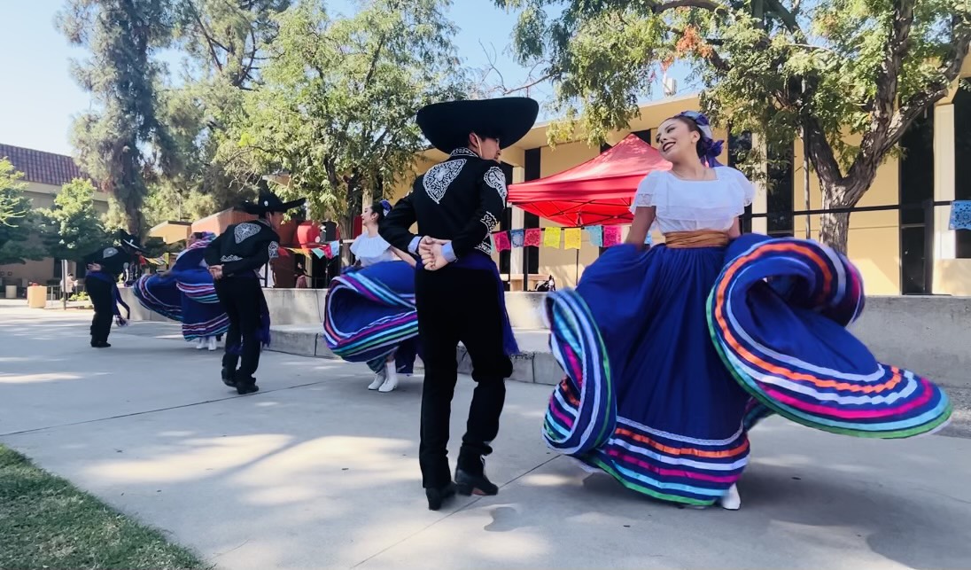 Students from Fresno High School Folklórico performing a Mexican Folk Dance, on Thurs. Sep 14, 2023 at the Veterans Square during the Kick-Off of Hispanic Heritage Month at Fresno City College campus.