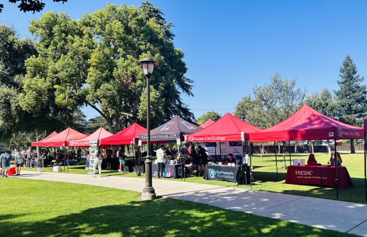 Participants gather for the Parkinson’s Moving Day Community Walk for Parkinsons Awareness at Fresno City College on Sat. Oct 7,2023.