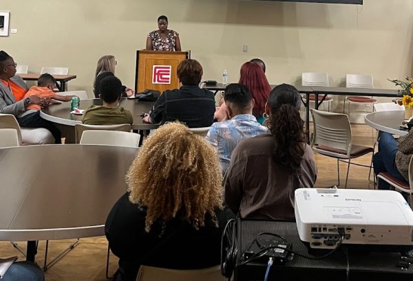 Dr. Apryl Lewis reading from her book “Black Feminism and Traumatic Legacies in Contemporary African American Literature” at her book launch on Oct. 17, 2023 at 7 p.m. at Fresno City College’s OAB 251.