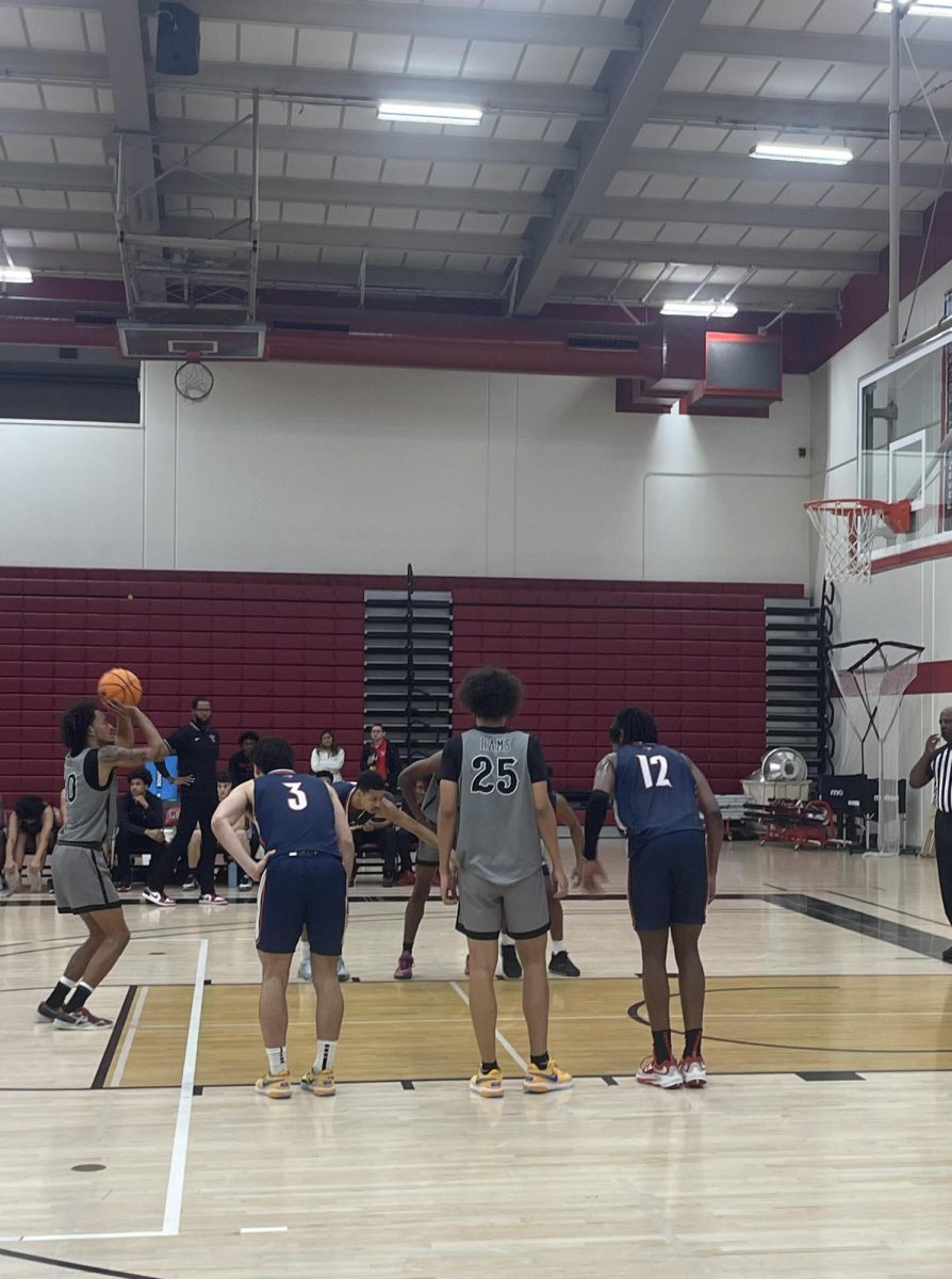 No. 20 Jalen Royster, shoots and makes a free throw on Nov. 17