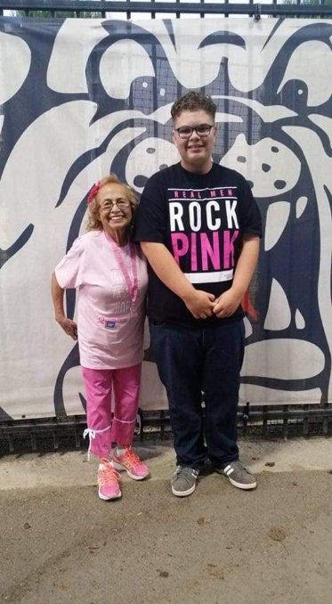 Josiah Poynter with his grandmother, Virgina, at a Fresno State Football game for Breast Cancer Night in 2017. 