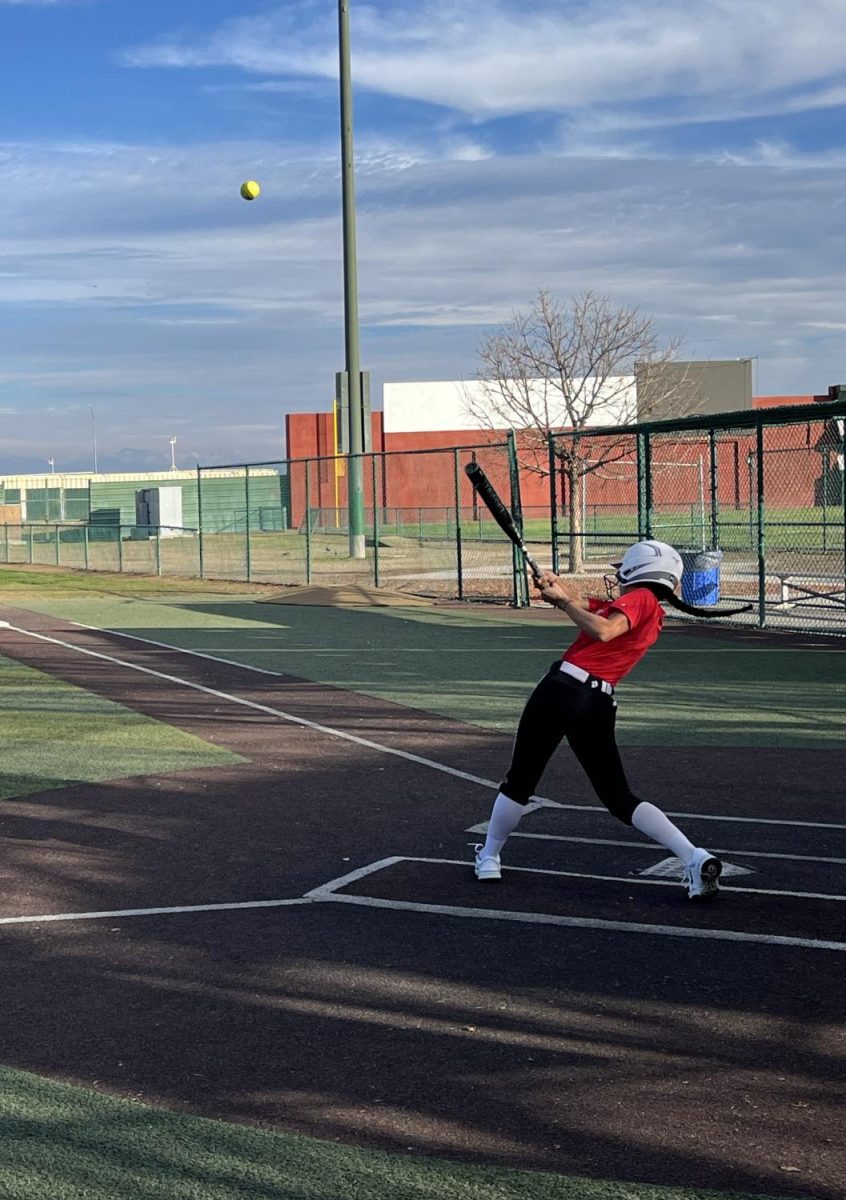 Azaria Sanchez, #2, striking a ball at home base during a hitting drill practice at Granite Park
on Jan. 30, 2024.