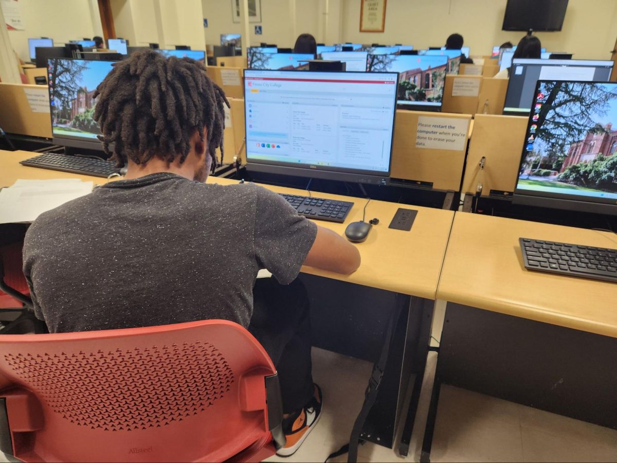 A student works in the Fresno City College library computer lab.
The room is quiet as others study on Canvas on Monday, Jan.
29, 2024.