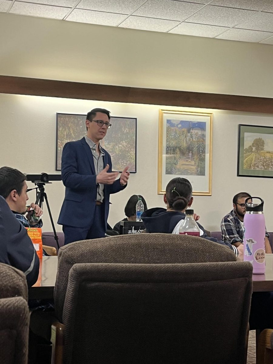 Edward EJ Hinojosa speaks at a forum at Fresno City College on Feb. 15.