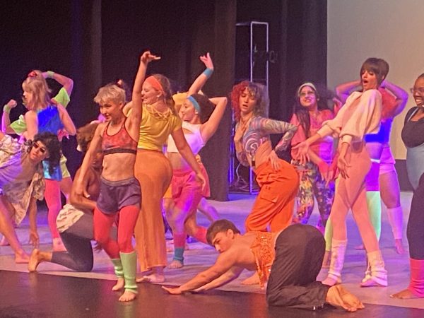 Dance Students pose in eighties workout fashion during “Commit to the BIT,” a dance choreographed by Alexandra Tiscareña and the cast. Photo taken during performance on April 12.
