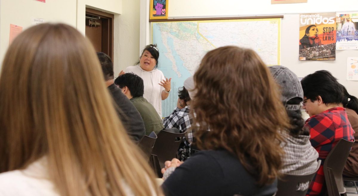 Gena Gong teaches a section of Intro to Ethnic Studies on April 23 to a large class of students in AH 108, where many other ethnic studies courses are taught.