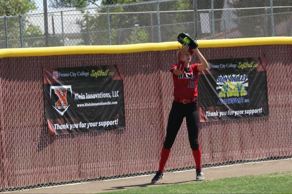Fresno City College left fielder no. 12 Olivia Moscardi catching a fly ball on
May 2, 2025 to beat CRC 5-0.