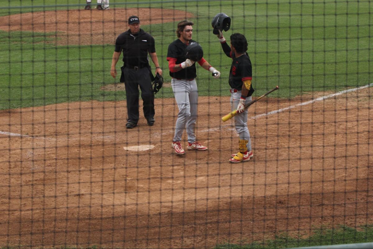 Fresno City College center fielder no. 25 Hunter Jansen hits a
home run on May 3, 2025 to beat Monterey 10-2.