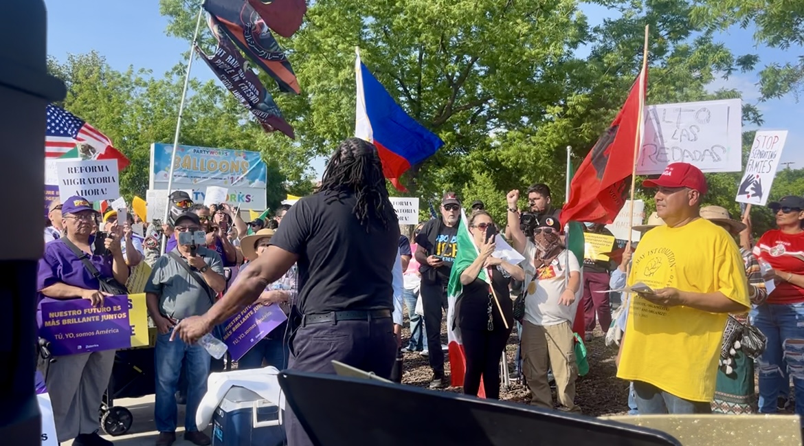 Saloome Muhammad, an organizer for BLACK Wellness & Prosperity Center (BWPC), speaks to the crowd of protesters on May 1, 2025.