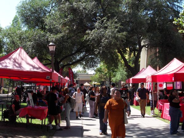 Fresno City College students attending Club Rush and visiting club booths at the college mall on Aug. 27, 2025. 
