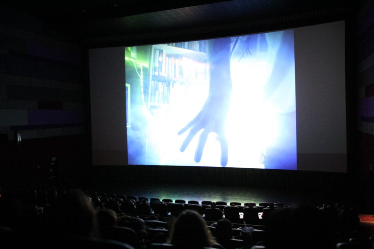 Moviegoers from around the central valley watch a scene from “The Glitch” that is projected onto the largest screen at Maya Cinemas for the CMAC 72 Hour Film Race screening on Aug. 22, 2025. 
