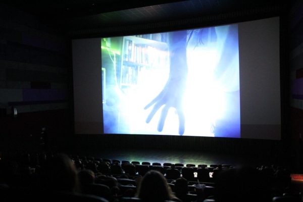 Moviegoers from around the central valley watch a scene from “The Glitch” that is projected onto the largest screen at Maya Cinemas for the CMAC 72 Hour Film Race screening on Aug. 22, 2025. 