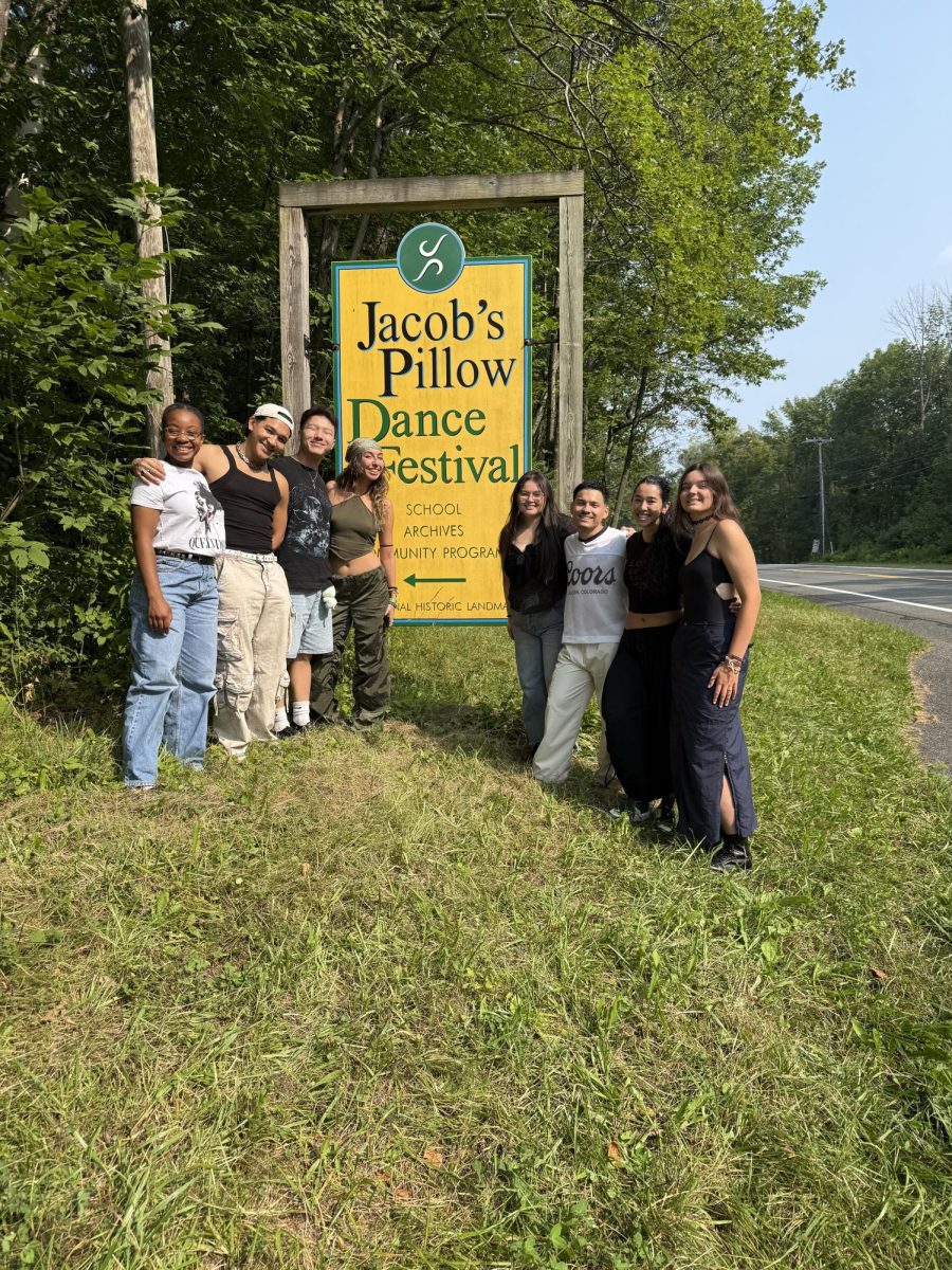 (left to right) Olyvia Stafford, Austin Chan, Eden Moua, Nicolette Miguel, Faith Vang, Jacob Gasca, Lauren Nishimoto and Haley Gilpin pose for a photo in front of the Jacob's Pillow Dance Festival sign on Aug. 5, 2025. Photo courtesy of FCC dance faculty.