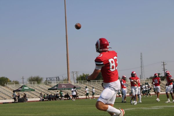 No. 83 Josiah Morley Rams wide receiver warming up for season opener at Ratcliff Stadium Aug. 30