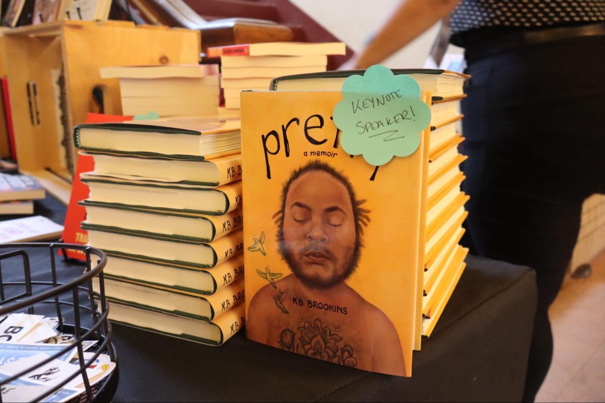 The KB Brookins novel "Pretty" is displayed with other books at the "Judging by the Cover: A Bookstore" table during the third Queer Housing Summit at Fresno City College in the Old Administration Building on Aug. 23.