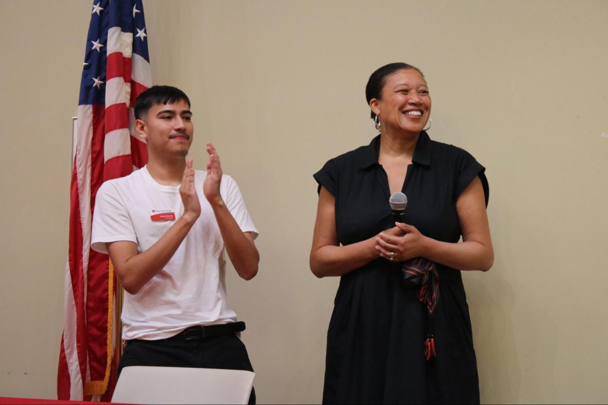 Associated Student Government Miguel Barrita (left) stands with Fresno City College President Denise Whisenhunt during the Q&A segment of the "Pizza With The Presidents" event on Oct. 2 in the Old Administration Building.