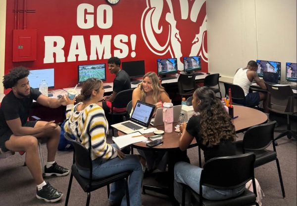 Student athletes inside The Zone conversing and getting work done on Oct. 6 at 10:09 a.m.