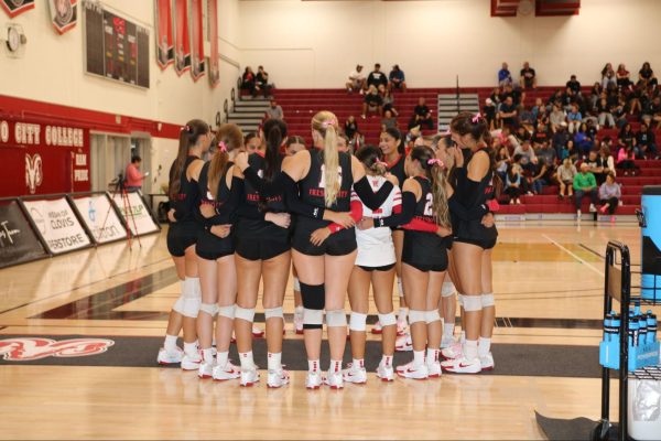 Fresno City College volleyball team huddles up before taking on Clovis Community at FCC Gymnasium on Oct. 3 