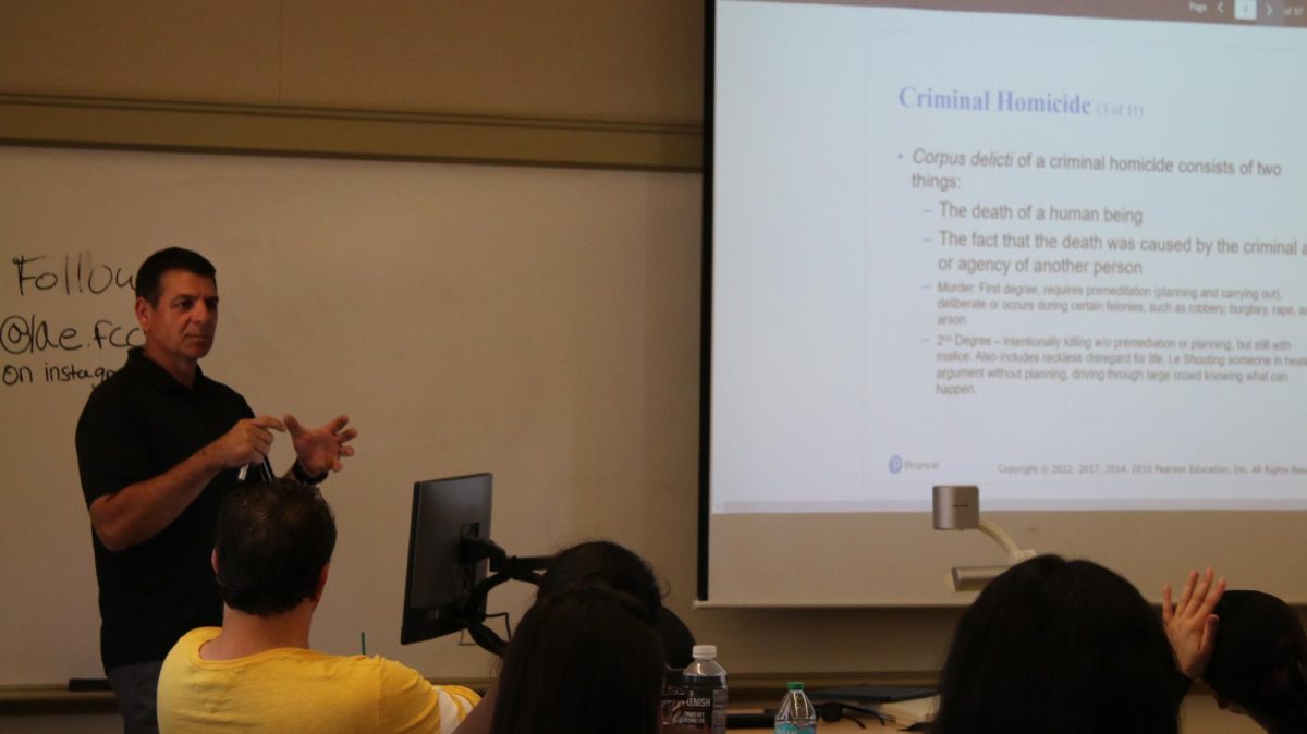 Eric Schmidt, the new criminology professor in the middle of a lecture at Fresno City College on Oct. 6, 2025.