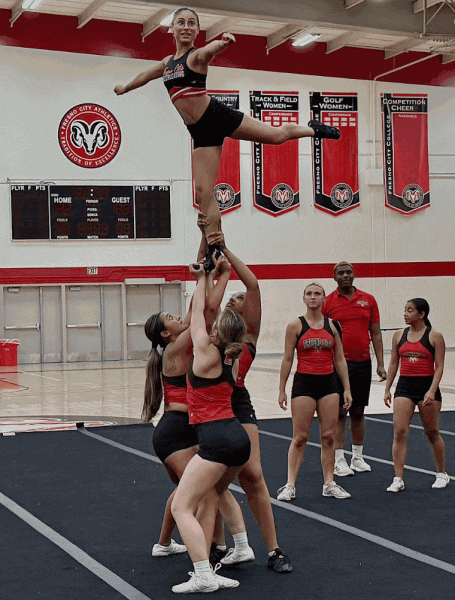 Fresno City College’s cheer/stunt team practicing their skills for competition season in the gym on Oct. 9.