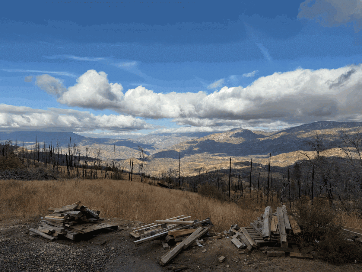 An overview of Meadow Lakes in November 2025 showing the aftermath of the Creek Fire that burned in 2020. Burn scars are still visible in the area with burnt trees and dry grass scattered over the area. 