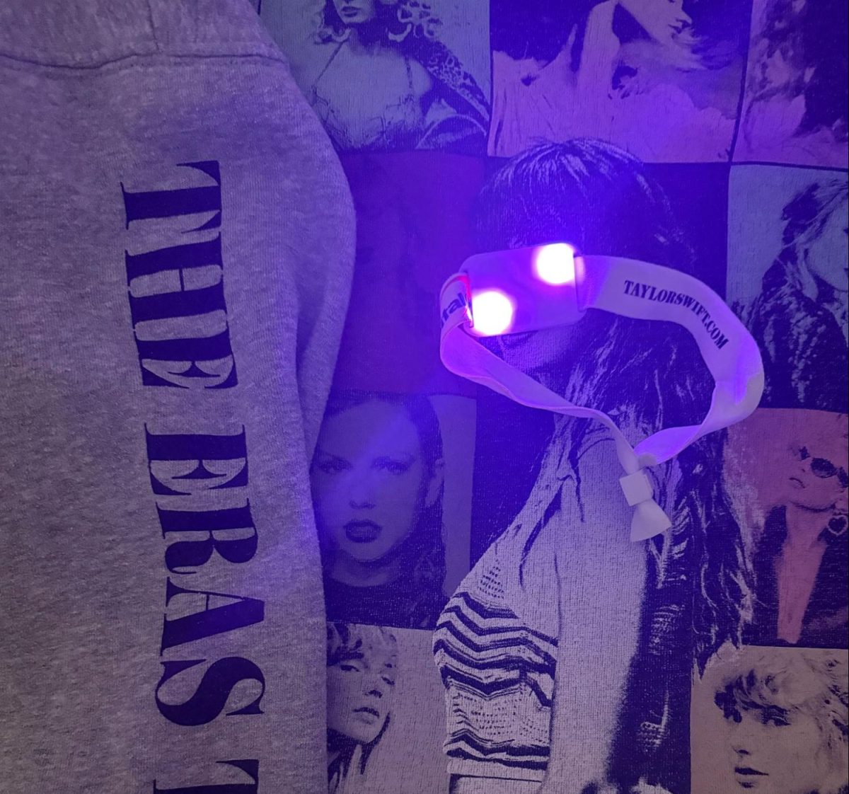 A light up bracelet displayed on top of tour merchandise from the Eras Tour performed by Taylor Swift on June 28, 2023.

