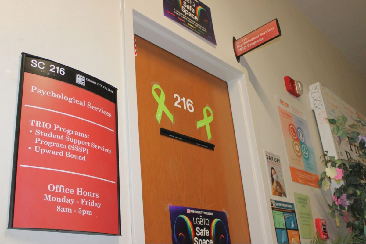 Fresno City College’s Basic Needs Center located in the Student Center shows a sign titled “Psychological Services” with its office hours on Feb. 21.