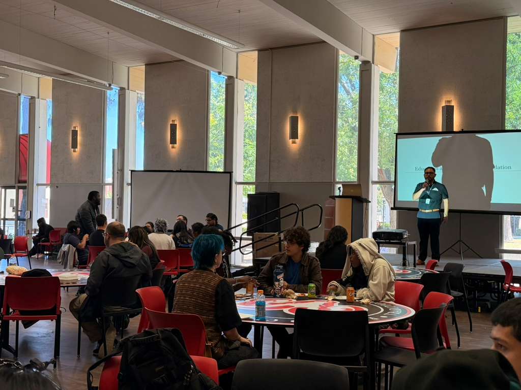 Photo of speaker Gustavo Gasca Gomez speaking to FCC students informing them of their rights in the Fresno City College cafeteria on April 23.